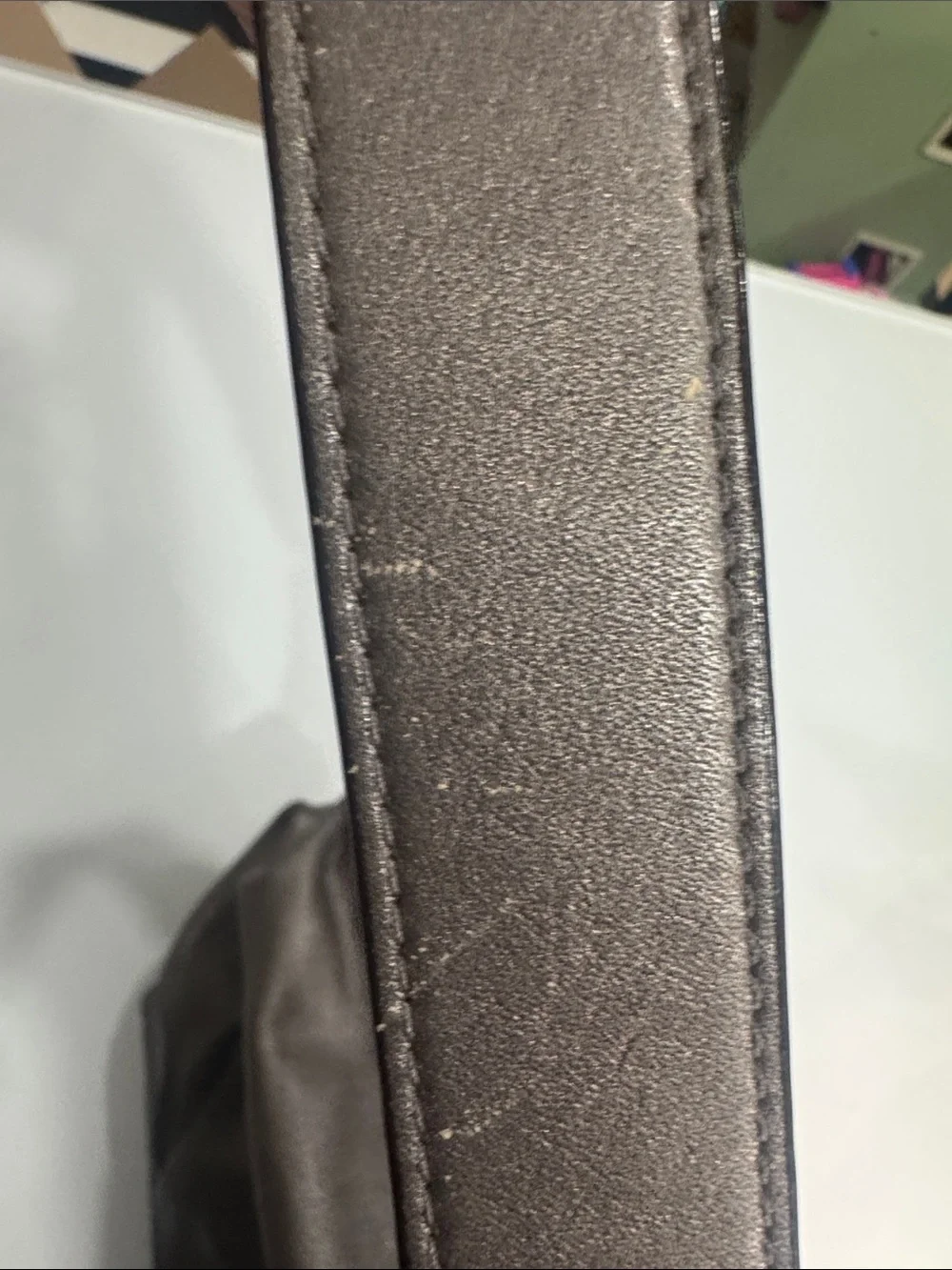 Coach Y2K Madison hobo bag featuring metallic pewter leather and silver studded
